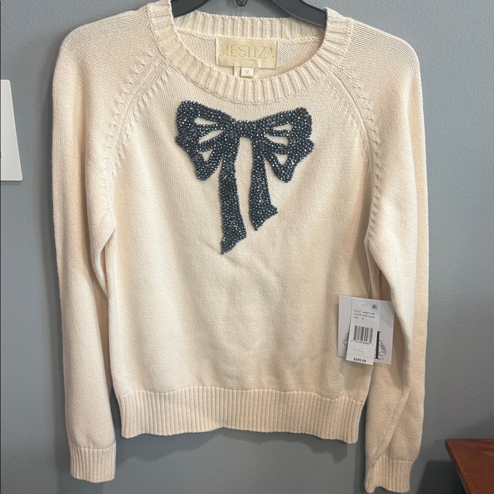 Mestiza Cream Sweater with Black Bow Accent